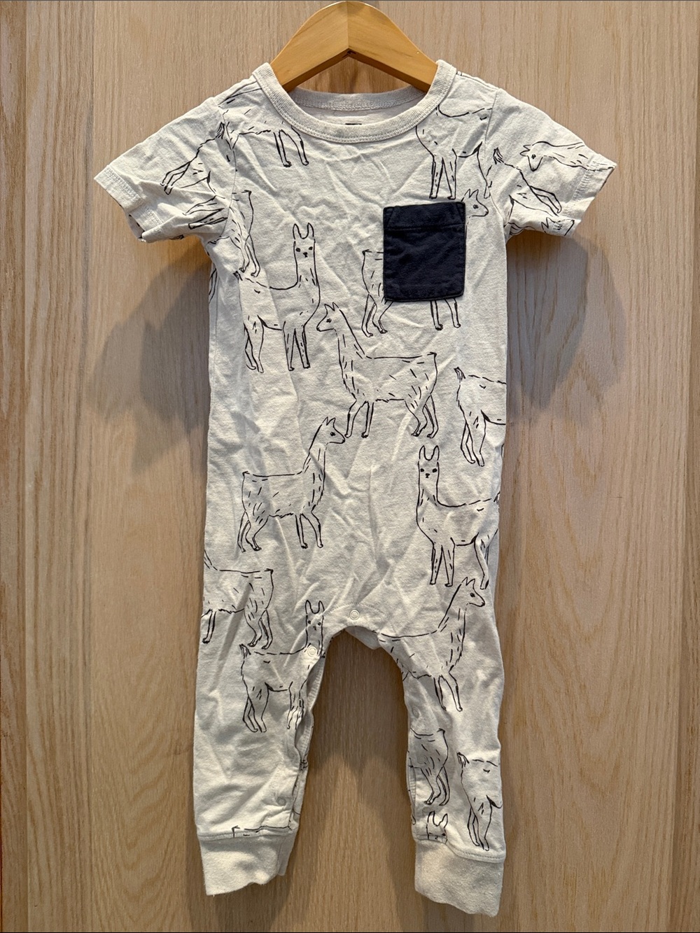 Tea Collection Cream Llama Print One-Piece with Navy Pocket